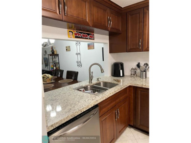 Welcome home to your beautiful turn key condo in the highly on Sunrise Lakes Phase IV Golf Course in Florida - for sale on GolfHomes.com, golf home, golf lot