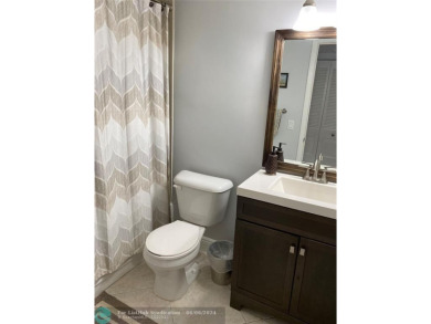 Welcome home to your beautiful turn key condo in the highly on Sunrise Lakes Phase IV Golf Course in Florida - for sale on GolfHomes.com, golf home, golf lot