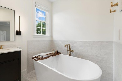 Experience elevated living in this custom-built Cape Cod home on Pete Dye River Course of Virginia Tech in Virginia - for sale on GolfHomes.com, golf home, golf lot