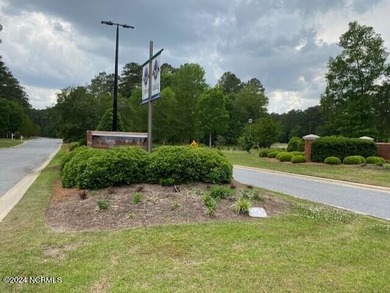 This is a corner lot just off Cypress Landing Trail in PH 2 on Cypress Landing Golf Club in North Carolina - for sale on GolfHomes.com, golf home, golf lot