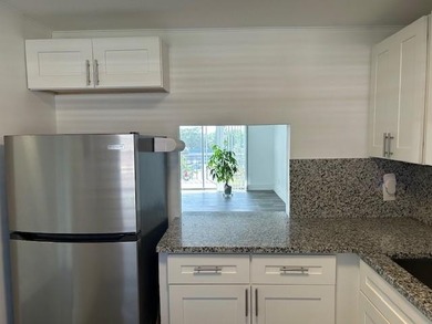 Spacious 2BR/2BA condo in the peaceful 55+ community of Oriole on Oriole Golf and Tennis Club in Florida - for sale on GolfHomes.com, golf home, golf lot