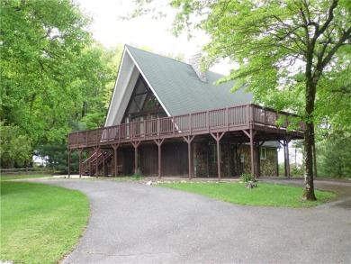 Wonderful Mountain Chalet Style Home in High Meadows Country on High Meadows Golf and Country Club in North Carolina - for sale on GolfHomes.com, golf home, golf lot