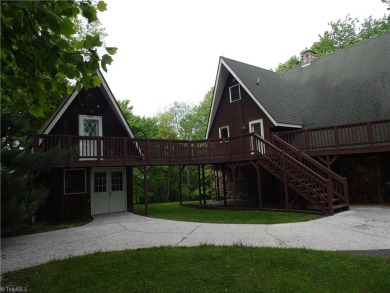 Wonderful Mountain Chalet Style Home in High Meadows Country on High Meadows Golf and Country Club in North Carolina - for sale on GolfHomes.com, golf home, golf lot