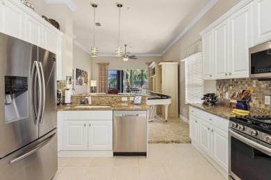 Beautiful large second-floor end unit coach home with on The Rookery At Marco in Florida - for sale on GolfHomes.com, golf home, golf lot