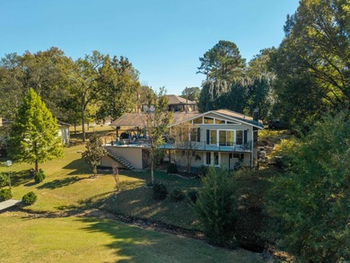 Full of personality and charm, this Diamondhead 2 bed 2.5 bath on Diamondhead Golf and Country Club in Arkansas - for sale on GolfHomes.com, golf home, golf lot
