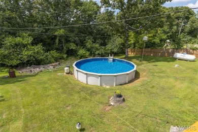 Welcome to your dream home in the sought-after Terre Du Lac on Terre Du Lac Golf and Country Club in Missouri - for sale on GolfHomes.com, golf home, golf lot