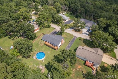 Welcome to your dream home in the sought-after Terre Du Lac on Terre Du Lac Golf and Country Club in Missouri - for sale on GolfHomes.com, golf home, golf lot