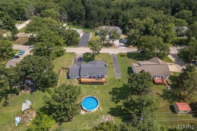 Welcome to your dream home in the sought-after Terre Du Lac on Terre Du Lac Golf and Country Club in Missouri - for sale on GolfHomes.com, golf home, golf lot