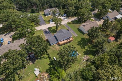 Welcome to your dream home in the sought-after Terre Du Lac on Terre Du Lac Golf and Country Club in Missouri - for sale on GolfHomes.com, golf home, golf lot