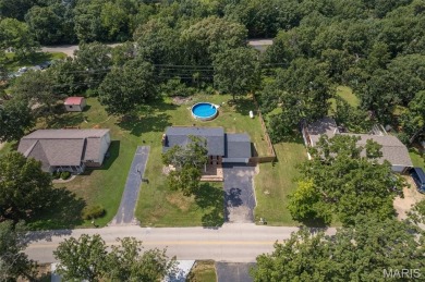 Welcome to your dream home in the sought-after Terre Du Lac on Terre Du Lac Golf and Country Club in Missouri - for sale on GolfHomes.com, golf home, golf lot