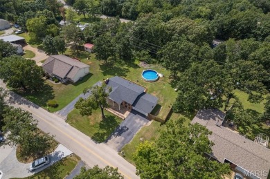 Welcome to your dream home in the sought-after Terre Du Lac on Terre Du Lac Golf and Country Club in Missouri - for sale on GolfHomes.com, golf home, golf lot