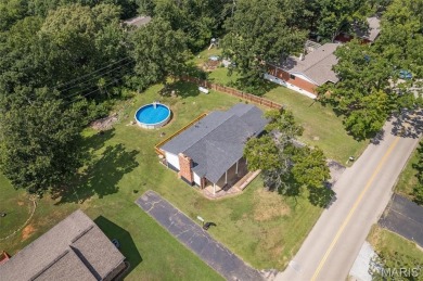 Welcome to your dream home in the sought-after Terre Du Lac on Terre Du Lac Golf and Country Club in Missouri - for sale on GolfHomes.com, golf home, golf lot