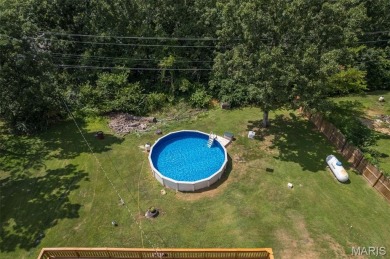 Welcome to your dream home in the sought-after Terre Du Lac on Terre Du Lac Golf and Country Club in Missouri - for sale on GolfHomes.com, golf home, golf lot