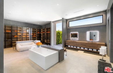 A breathtaking ultra-private warm contemporary estate showcasing on The Madison Club in California - for sale on GolfHomes.com, golf home, golf lot
