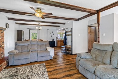 Welcome to your dream home in the sought-after Terre Du Lac on Terre Du Lac Golf and Country Club in Missouri - for sale on GolfHomes.com, golf home, golf lot