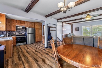 Welcome to your dream home in the sought-after Terre Du Lac on Terre Du Lac Golf and Country Club in Missouri - for sale on GolfHomes.com, golf home, golf lot