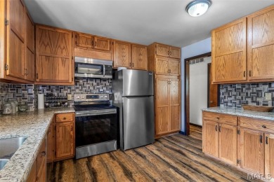 Welcome to your dream home in the sought-after Terre Du Lac on Terre Du Lac Golf and Country Club in Missouri - for sale on GolfHomes.com, golf home, golf lot