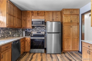 Welcome to your dream home in the sought-after Terre Du Lac on Terre Du Lac Golf and Country Club in Missouri - for sale on GolfHomes.com, golf home, golf lot
