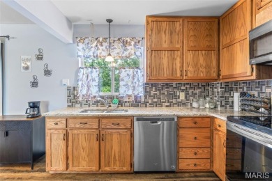 Welcome to your dream home in the sought-after Terre Du Lac on Terre Du Lac Golf and Country Club in Missouri - for sale on GolfHomes.com, golf home, golf lot