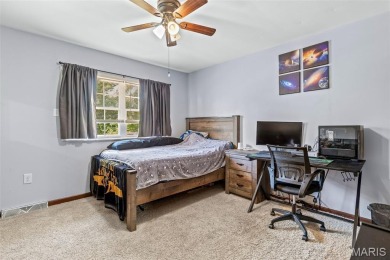 Welcome to your dream home in the sought-after Terre Du Lac on Terre Du Lac Golf and Country Club in Missouri - for sale on GolfHomes.com, golf home, golf lot