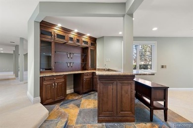Introducing a rare opportunity to own or rent this magnificent on Forest Lake Country Club in Michigan - for sale on GolfHomes.com, golf home, golf lot