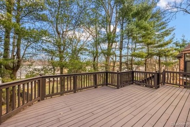 Introducing a rare opportunity to own or rent this magnificent on Forest Lake Country Club in Michigan - for sale on GolfHomes.com, golf home, golf lot