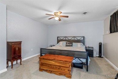 Welcome to your dream home in the sought-after Terre Du Lac on Terre Du Lac Golf and Country Club in Missouri - for sale on GolfHomes.com, golf home, golf lot