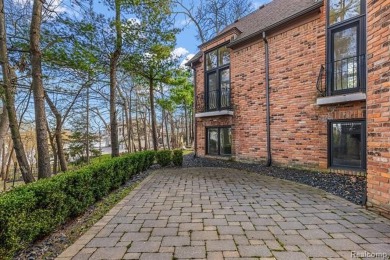 Introducing a rare opportunity to own or rent this magnificent on Forest Lake Country Club in Michigan - for sale on GolfHomes.com, golf home, golf lot
