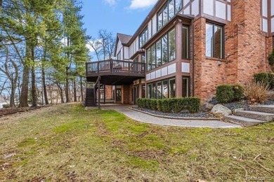 Introducing a rare opportunity to own or rent this magnificent on Forest Lake Country Club in Michigan - for sale on GolfHomes.com, golf home, golf lot
