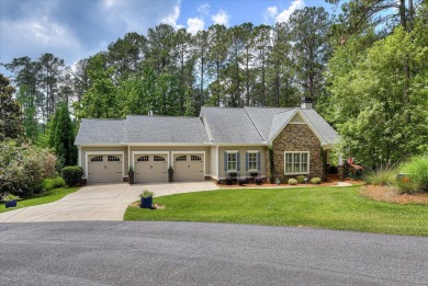 Embrace the ultimate lakefront lifestyle in this exquisite on Monticello Golf Club At Savannah Lakes in South Carolina - for sale on GolfHomes.com, golf home, golf lot