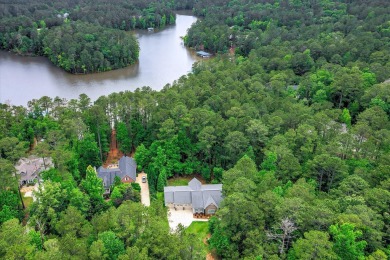 Embrace the ultimate lakefront lifestyle in this exquisite on Monticello Golf Club At Savannah Lakes in South Carolina - for sale on GolfHomes.com, golf home, golf lot