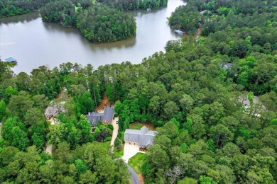 Embrace the ultimate lakefront lifestyle in this exquisite on Monticello Golf Club At Savannah Lakes in South Carolina - for sale on GolfHomes.com, golf home, golf lot