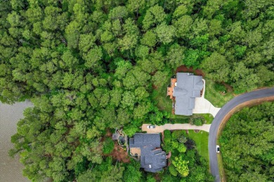 Embrace the ultimate lakefront lifestyle in this exquisite on Monticello Golf Club At Savannah Lakes in South Carolina - for sale on GolfHomes.com, golf home, golf lot