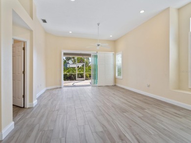 Spacious and bright larger 2-bedroom villa plus den and 2 full on University Park Country Club in Florida - for sale on GolfHomes.com, golf home, golf lot