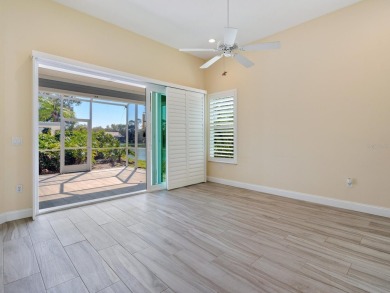Spacious and bright larger 2-bedroom villa plus den and 2 full on University Park Country Club in Florida - for sale on GolfHomes.com, golf home, golf lot
