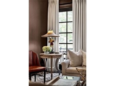 Enjoy the timeless charm of Charleston just minutes from Atlanta on Atlanta Athletic Club in Georgia - for sale on GolfHomes.com, golf home, golf lot