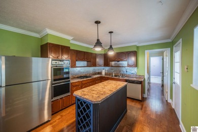 Two bedroom, 1.5-bath brick home offering 1,680 sq ft of on Calvert City Golf and Country Club in Kentucky - for sale on GolfHomes.com, golf home, golf lot
