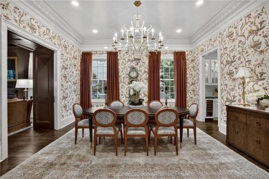 Enjoy the timeless charm of Charleston just minutes from Atlanta on Atlanta Athletic Club in Georgia - for sale on GolfHomes.com, golf home, golf lot