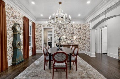 Enjoy the timeless charm of Charleston just minutes from Atlanta on Atlanta Athletic Club in Georgia - for sale on GolfHomes.com, golf home, golf lot