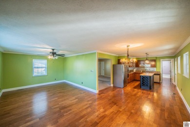 Two bedroom, 1.5-bath brick home offering 1,680 sq ft of on Calvert City Golf and Country Club in Kentucky - for sale on GolfHomes.com, golf home, golf lot