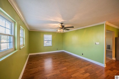 Two bedroom, 1.5-bath brick home offering 1,680 sq ft of on Calvert City Golf and Country Club in Kentucky - for sale on GolfHomes.com, golf home, golf lot
