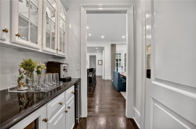 Enjoy the timeless charm of Charleston just minutes from Atlanta on Atlanta Athletic Club in Georgia - for sale on GolfHomes.com, golf home, golf lot