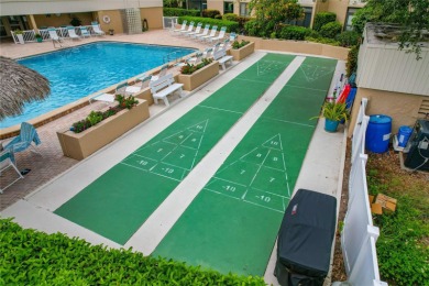 Golf Course. Inside, the living room opens to wide-open water on Cove Cay Country Club in Florida - for sale on GolfHomes.com, golf home, golf lot