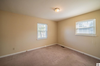 Two bedroom, 1.5-bath brick home offering 1,680 sq ft of on Calvert City Golf and Country Club in Kentucky - for sale on GolfHomes.com, golf home, golf lot