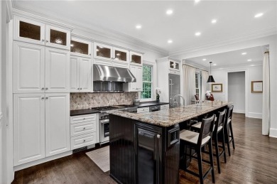 Enjoy the timeless charm of Charleston just minutes from Atlanta on Atlanta Athletic Club in Georgia - for sale on GolfHomes.com, golf home, golf lot