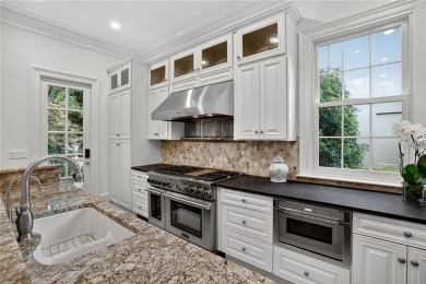 Enjoy the timeless charm of Charleston just minutes from Atlanta on Atlanta Athletic Club in Georgia - for sale on GolfHomes.com, golf home, golf lot