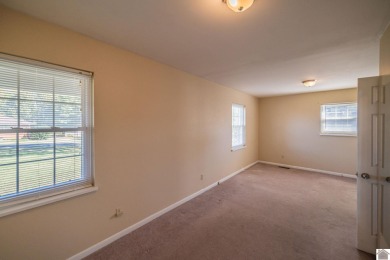 Two bedroom, 1.5-bath brick home offering 1,680 sq ft of on Calvert City Golf and Country Club in Kentucky - for sale on GolfHomes.com, golf home, golf lot