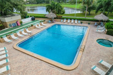 Golf Course. Inside, the living room opens to wide-open water on Cove Cay Country Club in Florida - for sale on GolfHomes.com, golf home, golf lot