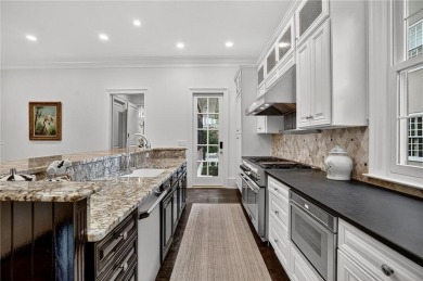Enjoy the timeless charm of Charleston just minutes from Atlanta on Atlanta Athletic Club in Georgia - for sale on GolfHomes.com, golf home, golf lot