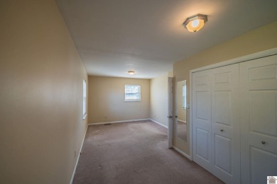 Two bedroom, 1.5-bath brick home offering 1,680 sq ft of on Calvert City Golf and Country Club in Kentucky - for sale on GolfHomes.com, golf home, golf lot